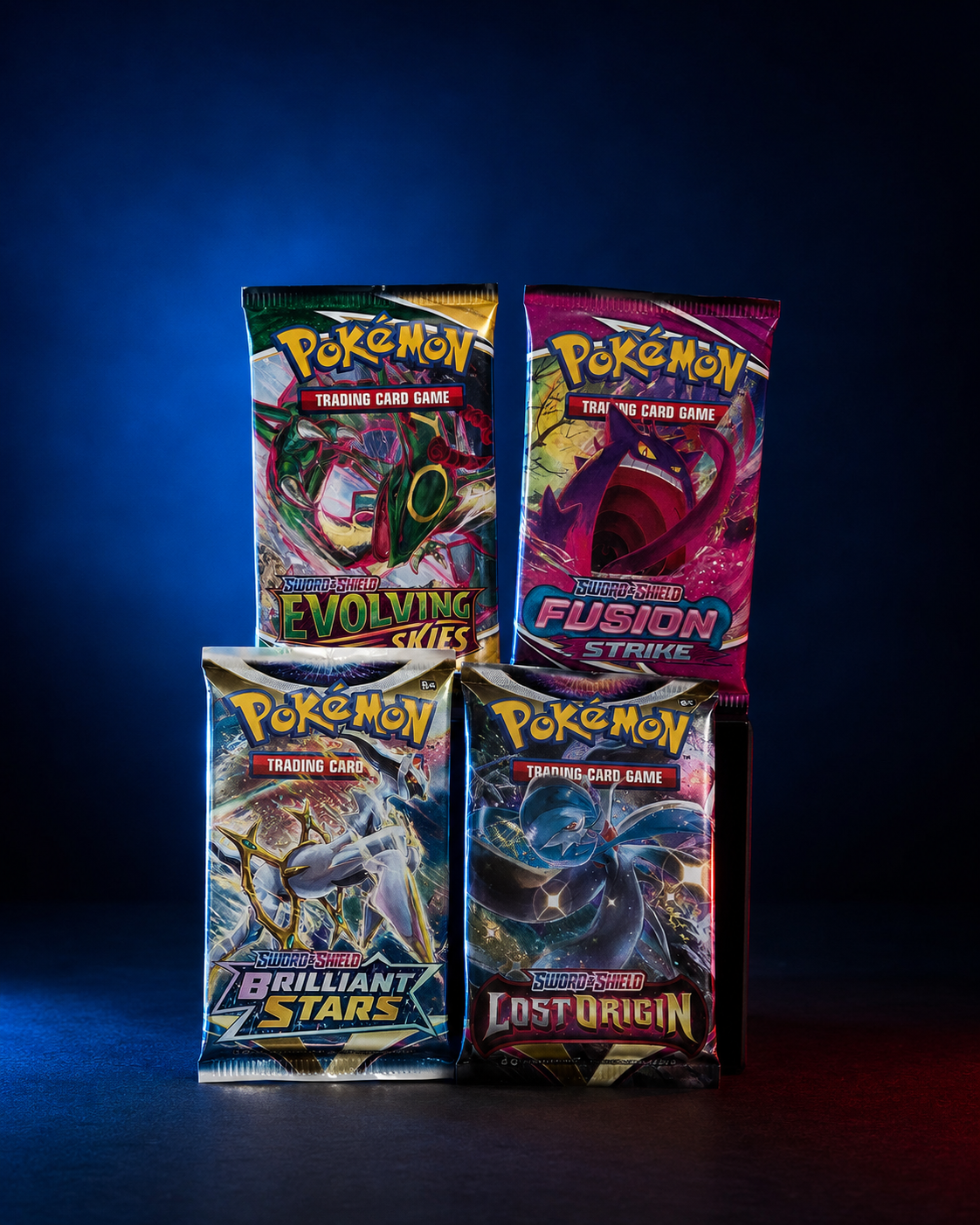 Fyra förseglade Pokémon booster-paket från Sword & Shield-serien